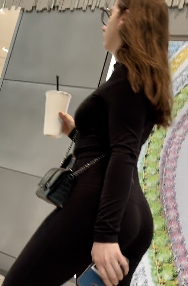 Brunette with glasses in leggings at the sports store #8atr3W4Y