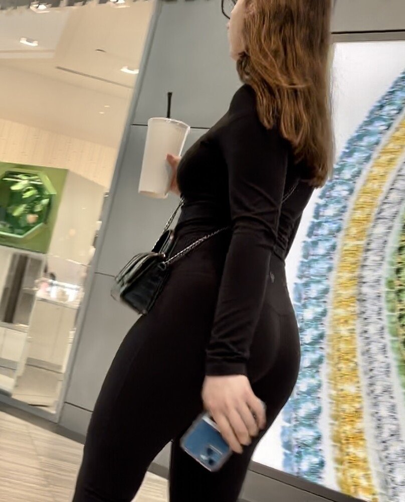 Brunette with glasses in leggings at the sports store #8hVg8eaO