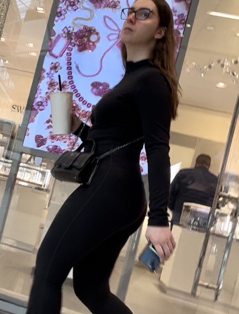 Brunette with glasses in leggings at the sports store #Qu7nRODN